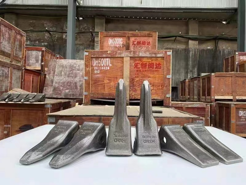 зубья ковша